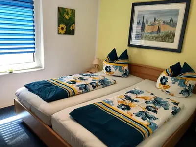 Ein Bett oder Betten in einem Zimmer der Unterkunft Ferienhaus am See