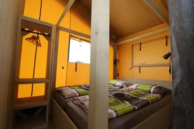 Ein Bett oder Betten in einem Zimmer der Unterkunft Landgut Voigtsmühle