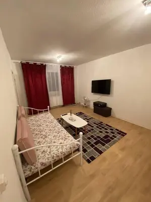Ein Bett oder Betten in einem Zimmer der Unterkunft Gemütliche Wohnung mit Smart-TV und großem Balkon