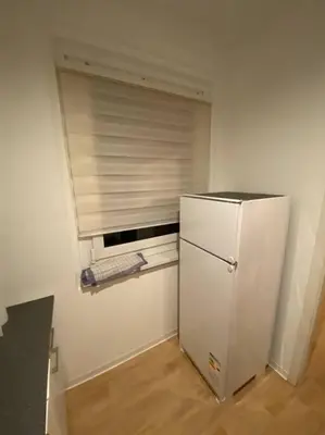 Küche/Küchenzeile in der Unterkunft Gemütliche Wohnung mit Smart-TV und großem Balkon