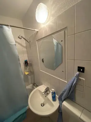 Ein Badezimmer in der Unterkunft Gemütliche Wohnung mit Smart-TV und großem Balkon