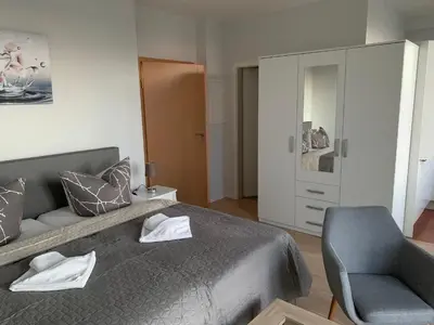 Ein Sitzbereich in der Unterkunft Einraumapartment mit Seeblickbalkon
