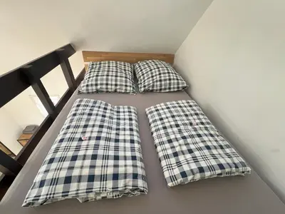 Ein Bett oder Betten in einem Zimmer der Unterkunft Ferienwohnung Kleinod