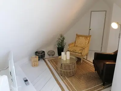 Ein Sitzbereich in der Unterkunft Loft 