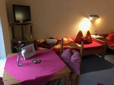 Ein Bett oder Betten in einem Zimmer der Unterkunft Pension Petersohn (ehem. Zur Heimat)