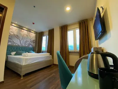 TV/Unterhaltungsangebot in der Unterkunft Hotel Grand Inn