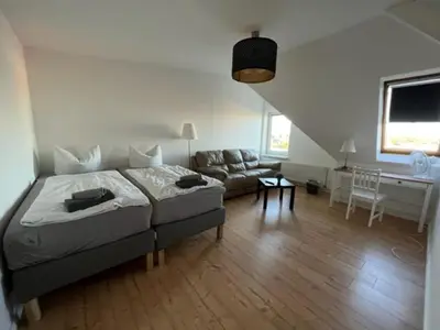 Ein Bett oder Betten in einem Zimmer der Unterkunft Gästewohnung Eberswalde