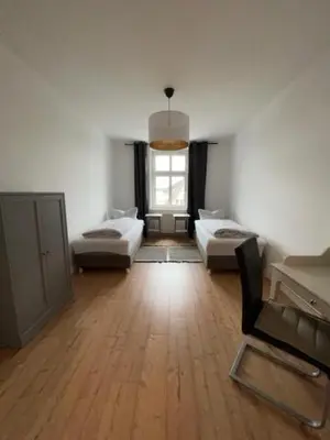 Ein Bett oder Betten in einem Zimmer der Unterkunft Gästewohnung Eberswalde