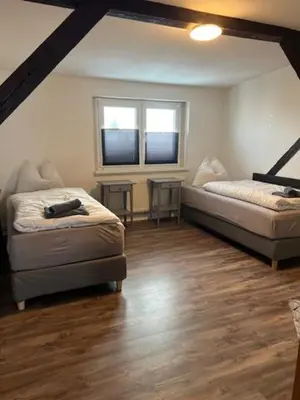Ein Bett oder Betten in einem Zimmer der Unterkunft Gästewohnung Eberswalde