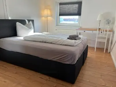 Ein Bett oder Betten in einem Zimmer der Unterkunft Gästewohnung Eberswalde
