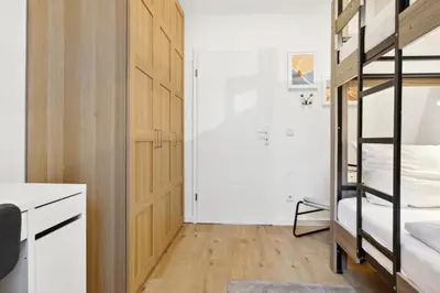 Ein Bett oder Betten in einem Zimmer der Unterkunft Arbio I Lux Apartment in Charlottenberg