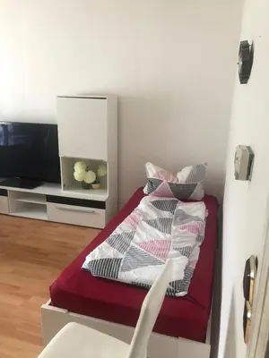 Ein Bett oder Betten in einem Zimmer der Unterkunft Schöner Wohnen in Königs Wusterhausen bei Berlin 2