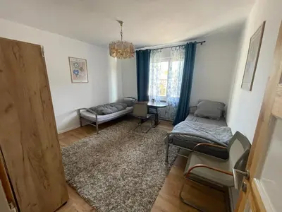 Ein Bett oder Betten in einem Zimmer der Unterkunft Mounterenhaus - Zimmer in Finow Eberswalde