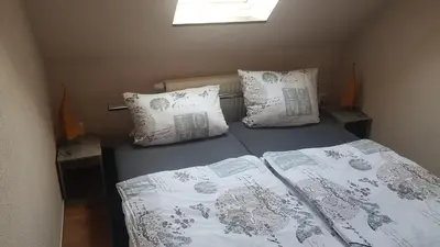 Ein Bett oder Betten in einem Zimmer der Unterkunft Seeblick