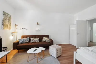 Ein Bett oder Betten in einem Zimmer der Unterkunft Arbio I Cozy apartment near Ku'damm with parking