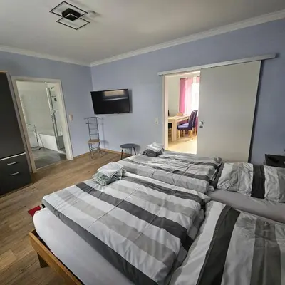 Ein Bett oder Betten in einem Zimmer der Unterkunft Gartenblick Trebbin