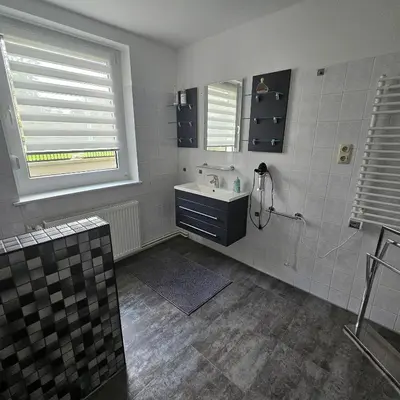 Ein Badezimmer in der Unterkunft Gartenblick Trebbin