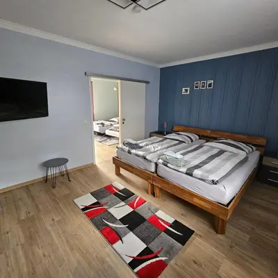 Ein Bett oder Betten in einem Zimmer der Unterkunft Gartenblick Trebbin