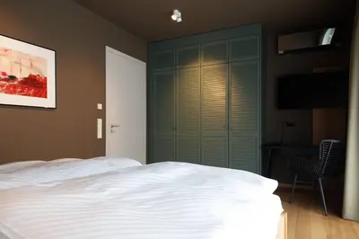 Ein Bett oder Betten in einem Zimmer der Unterkunft Gerono - Haus am See
