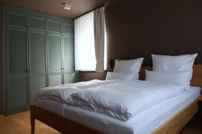 Ein Bett oder Betten in einem Zimmer der Unterkunft Gerono - Haus am See