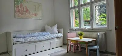 Ein Bett oder Betten in einem Zimmer der Unterkunft Kleines Landhaus am Wald Bad Saarow