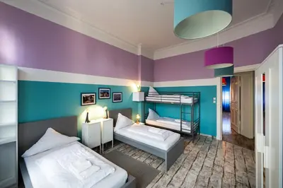 Ein Bett oder Betten in einem Zimmer der Unterkunft Ferienwohnung bis 8 Personen