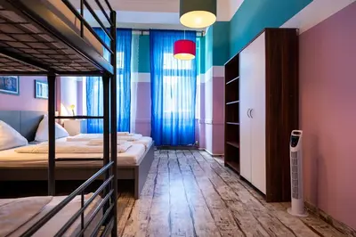 Ein Bett oder Betten in einem Zimmer der Unterkunft Ferienwohnung bis 8 Personen