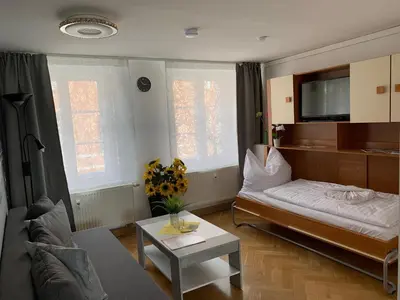 Ein Bett oder Betten in einem Zimmer der Unterkunft Ferienwohnung Nikolaiblick