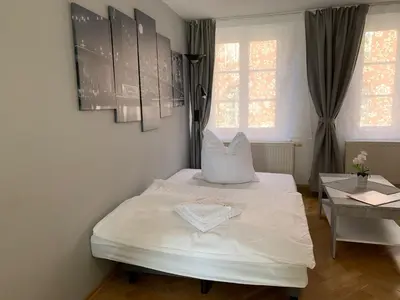Ein Bett oder Betten in einem Zimmer der Unterkunft Ferienwohnung Nikolaiblick