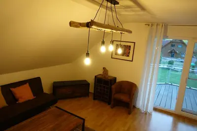 Ein Sitzbereich in der Unterkunft Ferienwohnung Thuja