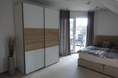 Ein Bett oder Betten in einem Zimmer der Unterkunft Ferienwohnung Thuja