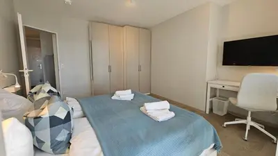 Ein Bett oder Betten in einem Zimmer der Unterkunft Apartment am See Bad Saarow
