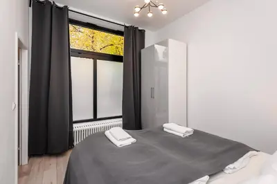 Ein Bett oder Betten in einem Zimmer der Unterkunft Schönes Serviced Apartment in Berlin