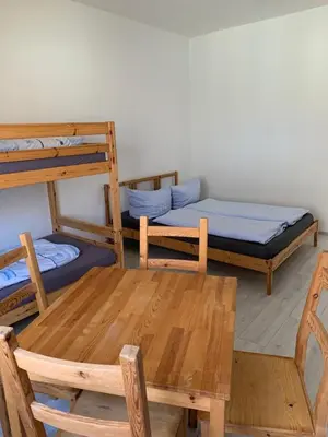 Ein Bett oder Betten in einem Zimmer der Unterkunft Tauchbasis Stechlin