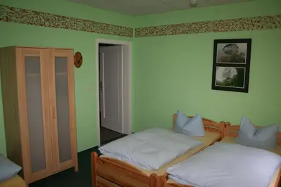 Ein Bett oder Betten in einem Zimmer der Unterkunft Tauchbasis Stechlin