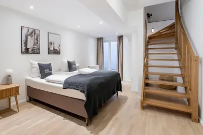Ein Bett oder Betten in einem Zimmer der Unterkunft Schoenhouse City Street
