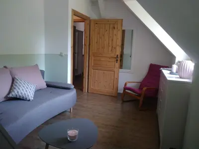 Ein Sitzbereich in der Unterkunft Ferienwohnung Fuchsberge