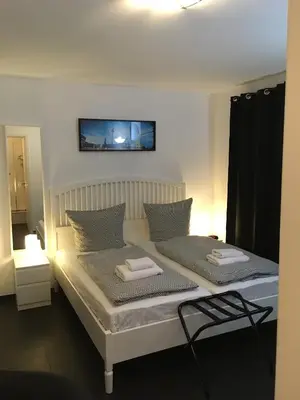 Ein Bett oder Betten in einem Zimmer der Unterkunft New Green Apartments