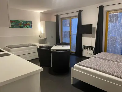 Ein Bett oder Betten in einem Zimmer der Unterkunft New Green Apartments