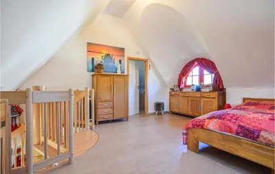 Ein Bett oder Betten in einem Zimmer der Unterkunft Ferienhaus Wendisch-Rietz Sturmm�we, Luisenaue