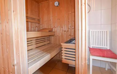 Ein Bett oder Betten in einem Zimmer der Unterkunft Ferienhaus Wendisch-Rietz Sturmm�we, Luisenaue