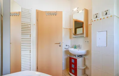 Ein Badezimmer in der Unterkunft Ferienhaus Wendisch-Rietz Rohrweihe, Luisenaue III