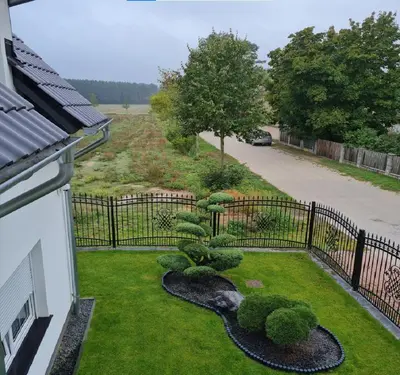 Ein Garten an der Unterkunft SECRA Exclusive Ferienwohnung Schlaubetal Müllrose 1 - Seenähe