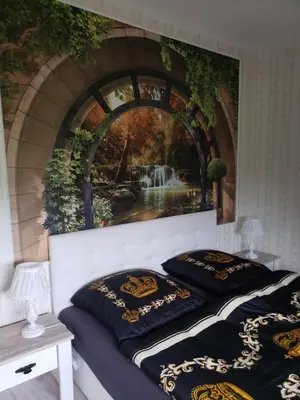 Ein Bett oder Betten in einem Zimmer der Unterkunft SECRA Exclusive Ferienwohnung Schlaubetal Müllrose 1 - Seenähe