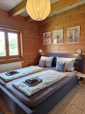 Ein Bett oder Betten in einem Zimmer der Unterkunft Helle und idyllische 2 Zimmer Wohnung am Rande von Berlin