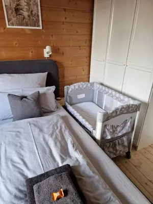 Ein Bett oder Betten in einem Zimmer der Unterkunft Helle und idyllische 2 Zimmer Wohnung am Rande von Berlin