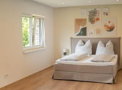 Ein Bett oder Betten in einem Zimmer der Unterkunft Finca Berlin nähe Olympiastadion