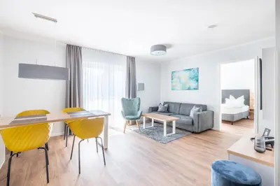 Ein Sitzbereich in der Unterkunft Sporthotel Neuruppin - Apartmenthaus mit Ferienwohnungen