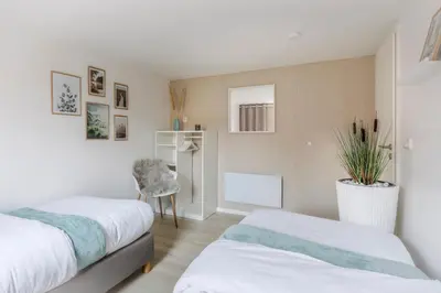 Ein Bett oder Betten in einem Zimmer der Unterkunft modernes Ferienhaus Sonnendeck 70 QM I Strandnah I Terrasse I 2 Schlafzimmer I Nähe Werbellinsee
