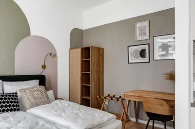 Ein Bett oder Betten in einem Zimmer der Unterkunft Arbio I Luxury Apartments in East Side Gallery